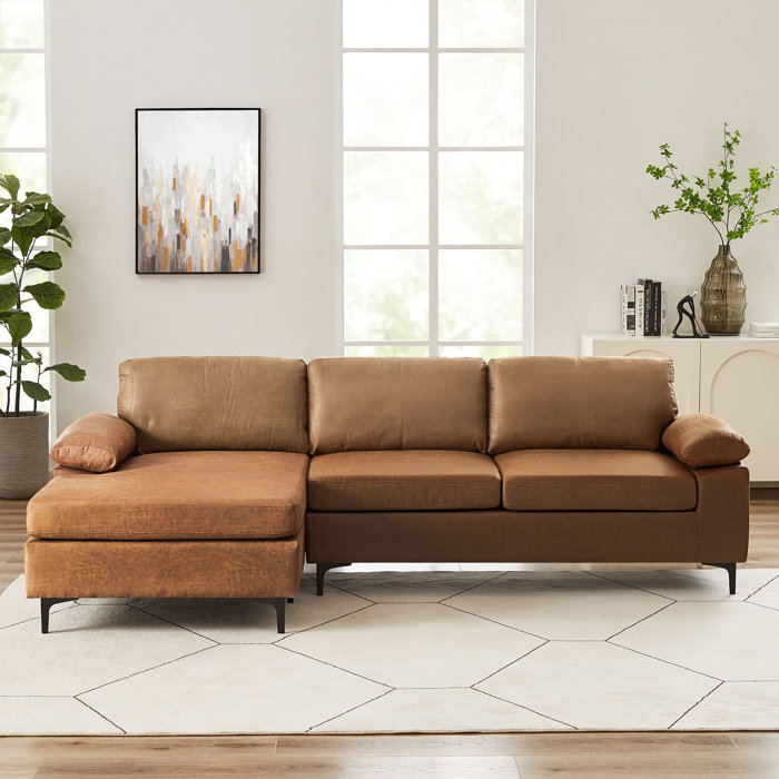 Wrought Studio Chanpreet 108" Wide Faux Leather Reversible Sofa & Chaise & Reviews Wayfair